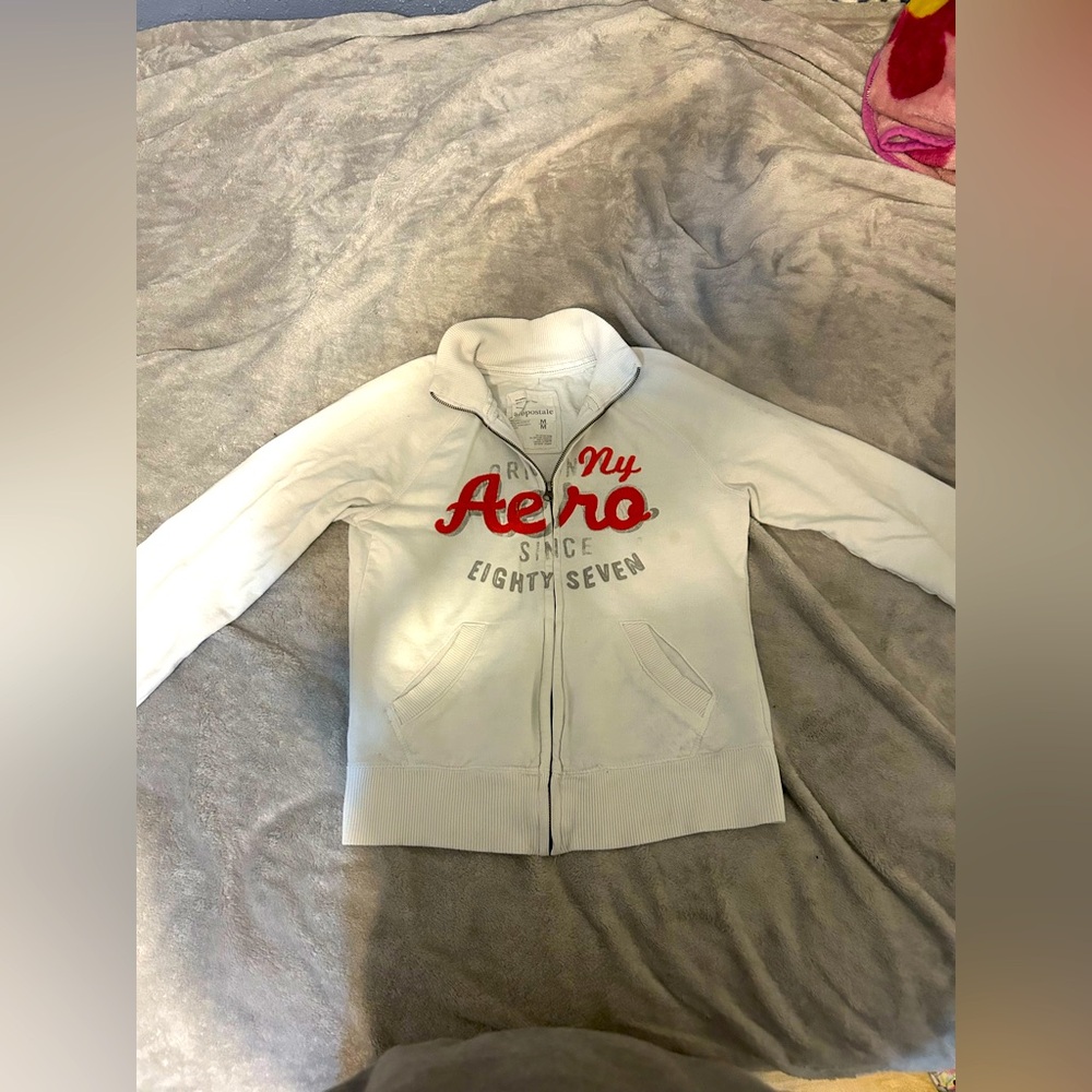 AERO postal 
White Zip-Up Hoodie with Red Logo
